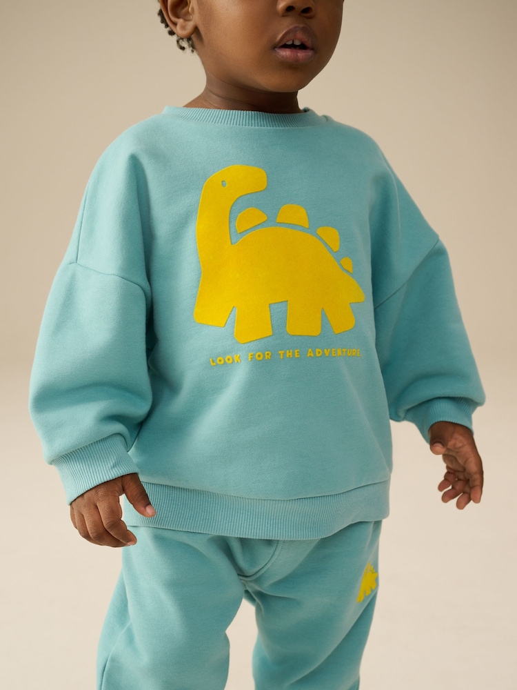 Grün/Gelb, Dino - Set mit Jersey-Sweatshirt und Jogginghose (3 Monate bis 7 Jahre) - Bild 2 von 4 Grün/Gelb, Dino - Set mit Jersey-Sweatshirt und Jogginghose (3 Monate bis 7 Jahre) - Bild 2 von 4
