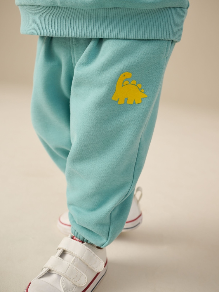 Grün/Gelb, Dino - Set mit Jersey-Sweatshirt und Jogginghose (3 Monate bis 7 Jahre) - Bild 4 von 4 Grün/Gelb, Dino - Set mit Jersey-Sweatshirt und Jogginghose (3 Monate bis 7 Jahre) - Bild 4 von 4