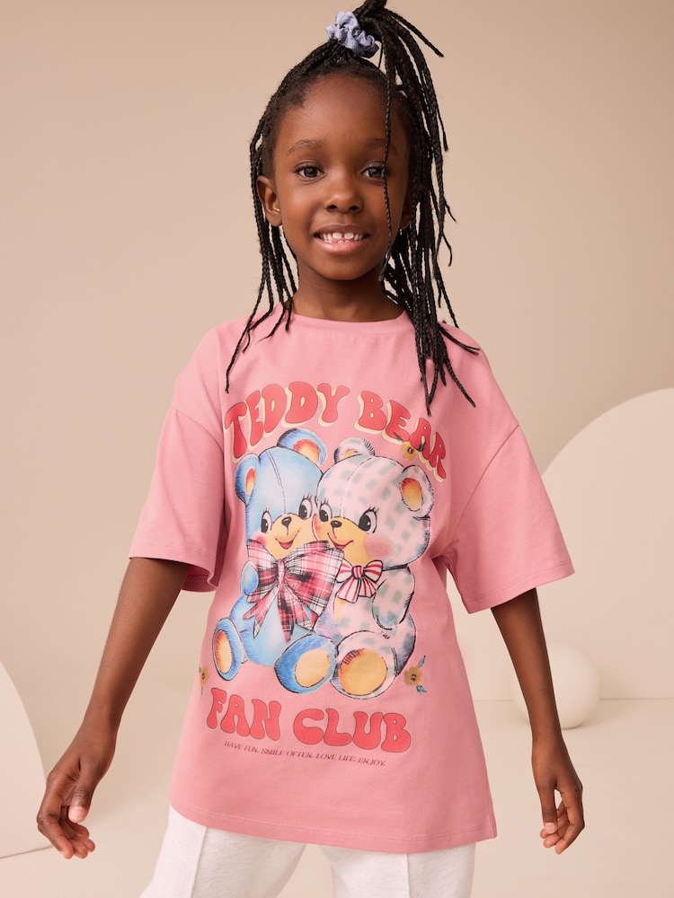 Pink Oversized Graphic Print T-Shirt (3-16yrs) - Image 1 of 7 Pink Oversized Graphic Print T-Shirt (3-16yrs) - Image 1 of 7