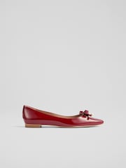 LK Bennett Red Mabel Patent Eyelet Bow Flats - Image 1 of 3