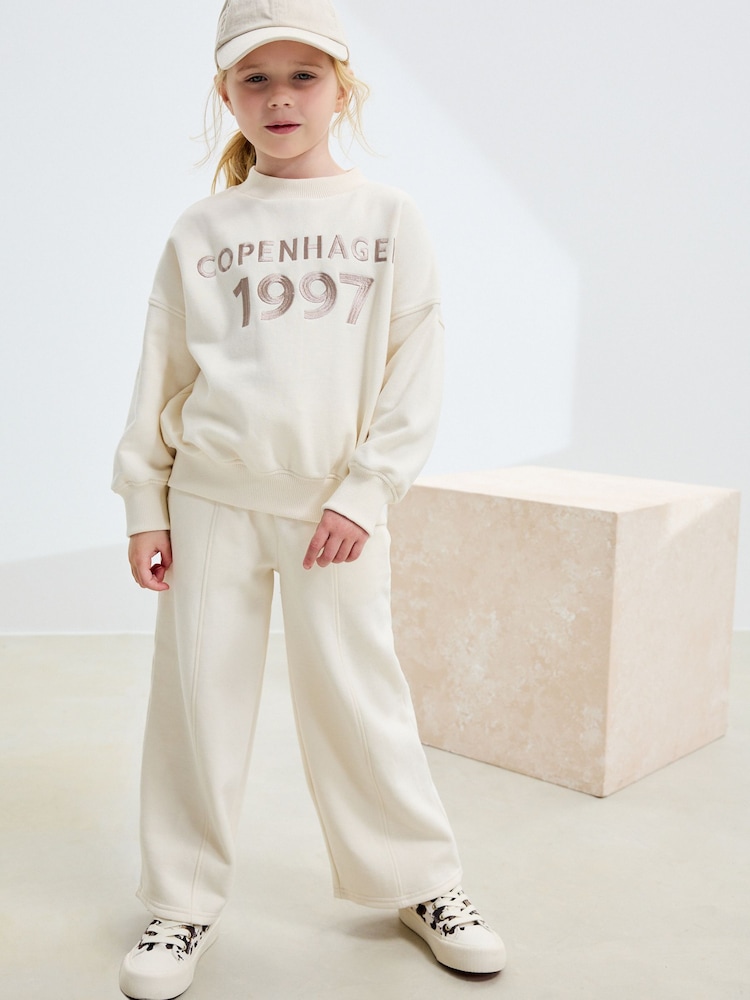 Slogan, natur - Sweatshirt und Jogginghose mit weitem Bein (3–16 J.) - Bild 1 von 11