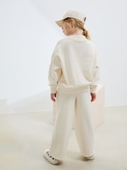 Slogan, natur - Sweatshirt und Jogginghose mit weitem Bein (3–16 J.) - Bild 5 von 11