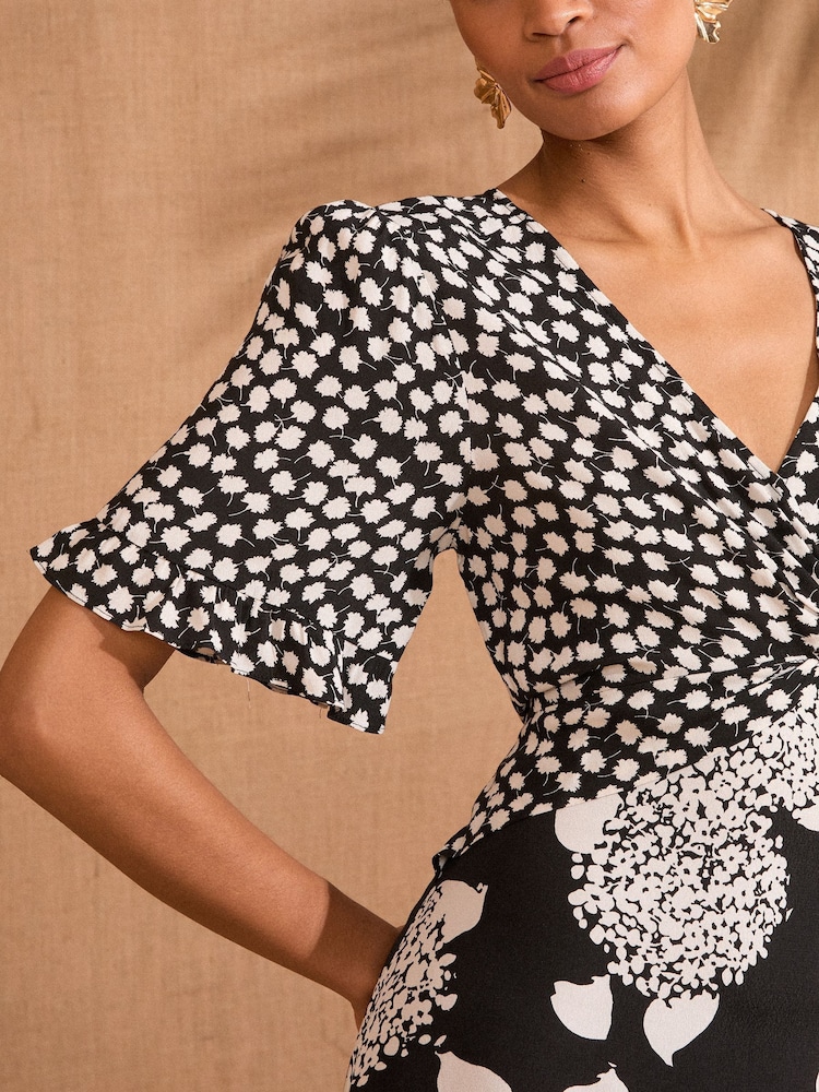 Love & Roses Black/White Floral Print Patched Twist Detail Midi Dress - Image 2 of 4 Love & Roses Black/White Floral Print Patched Twist Detail Midi Dress - Image 2 of 4