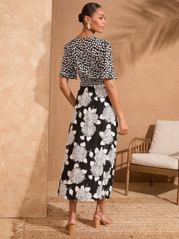 Love & Roses Black/White Floral Print Patched Twist Detail Midi Dress - Image 4 of 4 Love & Roses Black/White Floral Print Patched Twist Detail Midi Dress - Image 4 of 4
