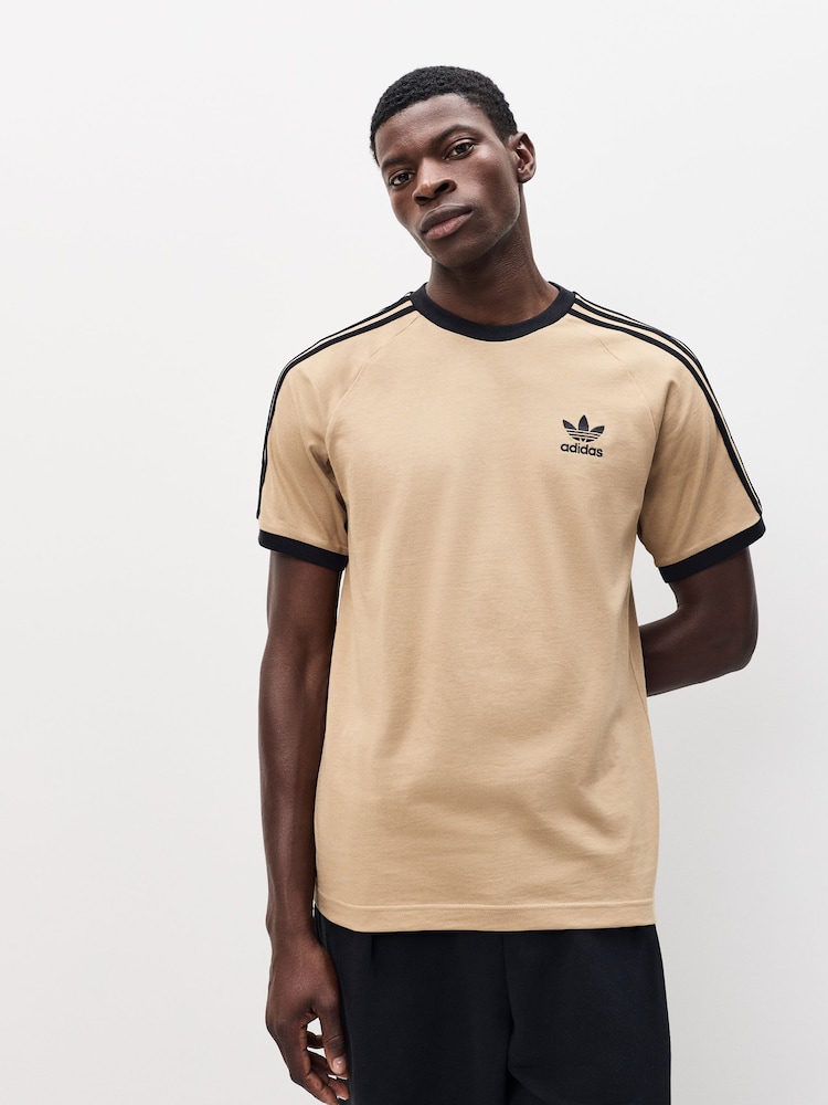 adidas Brown Adicolor Classics 3-Stripes 100% Cotton T-Shirt - Image 1 of 6 adidas Brown Adicolor Classics 3-Stripes 100% Cotton T-Shirt - Image 1 of 6