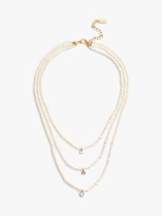 COACH Gold Tone Pearl Multilayer Charm Necklace - Image 1 of 3