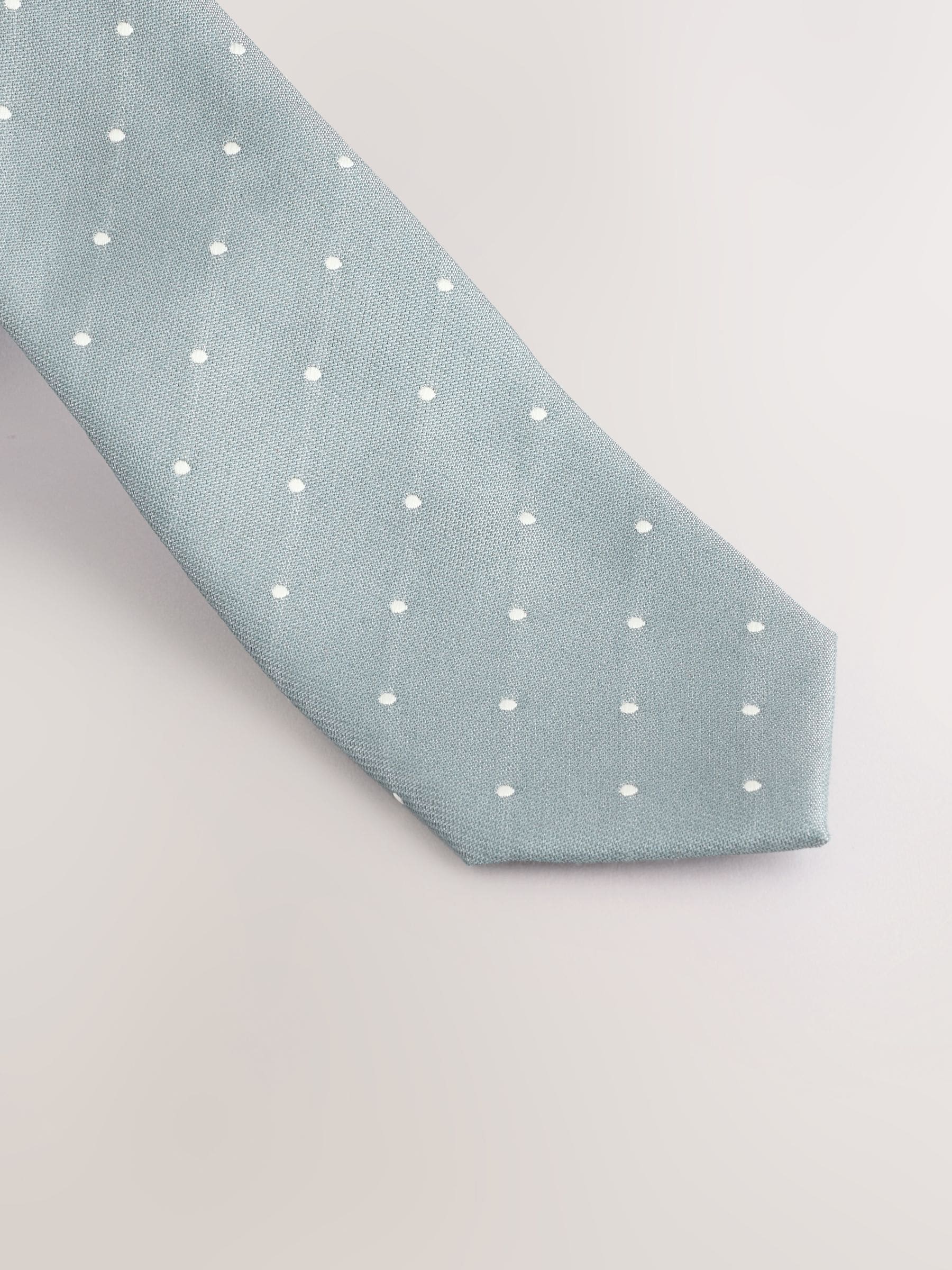 teal polka dot tie