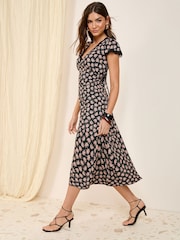 Friends Like These Black Ditsy Textured V-Neck Lace Trim Midi Dress - Image 1 of 4