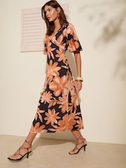 Friends Like These Orange Floral V-Neck ITY Flutter Sleeve Midi Dress - Image 1 of 5