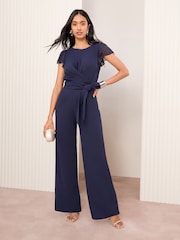Friends Like These Navy Blue Chiffon Scuba Wrap Front Jumpsuit - Image 1 of 4