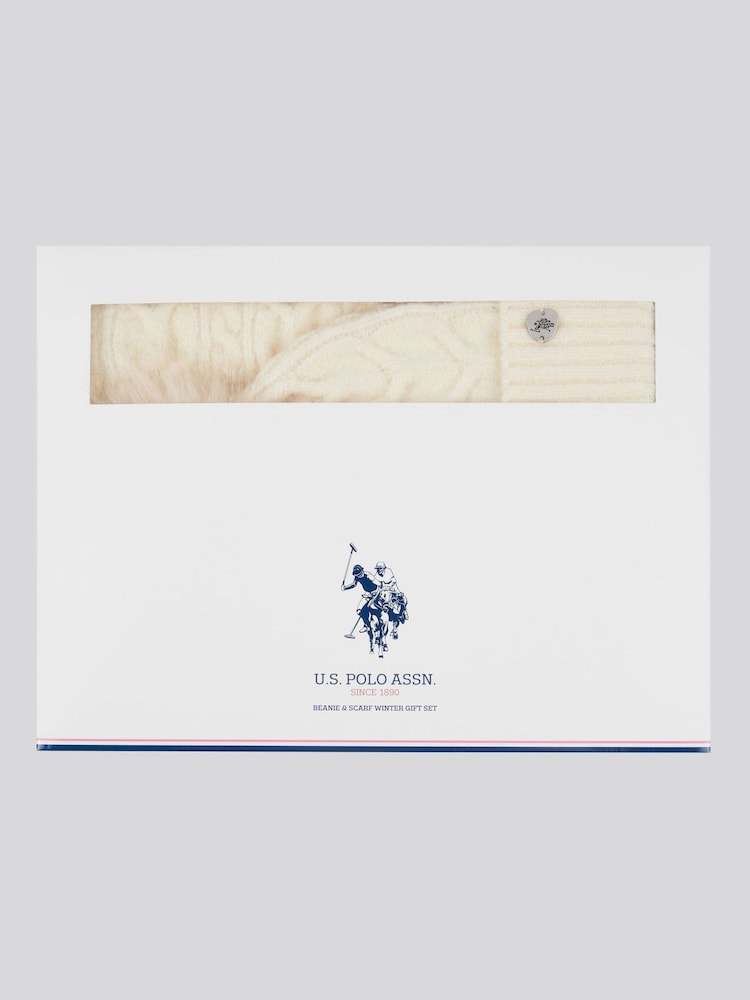 من U.S. Polo Assn. حزمة من وشاح وقبعة شتوية محبوكة بنمط مجدول للنساء Signature - صورة 1 من 4