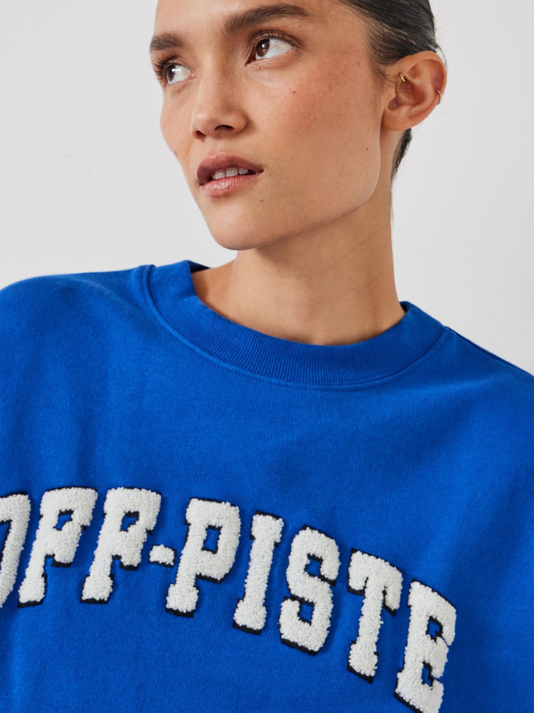 Buy Hush Blue Off-Piste Towelling Graphic 100% Cotton Sweatshirt