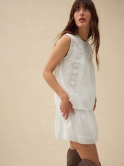 White Sleeveless Pintuck Blouse With Mesh Embroidery - Image 1 of 8