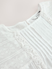 White Sleeveless Pintuck Blouse With Mesh Embroidery - Image 8 of 8