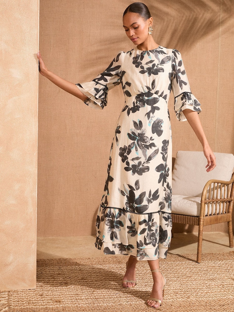 Love & Roses Ivory Floral Print Crew Neck Flute Sleeve Midi Dress - Image 1 of 4 Love & Roses Ivory Floral Print Crew Neck Flute Sleeve Midi Dress - Image 1 of 4