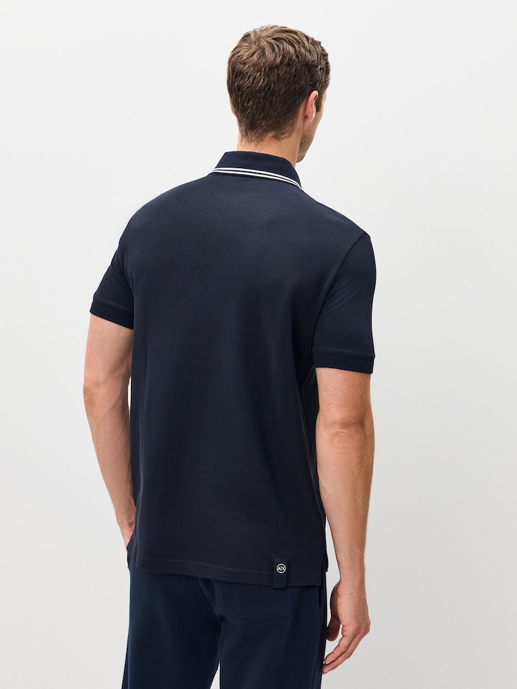 أزرق داكن - قميص بولو بتفاصيل على الحواف بتلبيس قياسي من Armani Exchange - صورة 2 من 5
