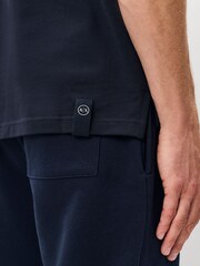 أزرق داكن - قميص بولو بتفاصيل على الحواف بتلبيس قياسي من Armani Exchange - صورة 4 من 5