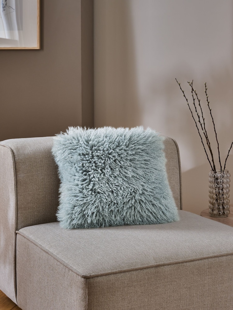 Light Blue 43 x 43cm Mongolian Faux Fur Cushion - Image 1 of 5 Light Blue 43 x 43cm Mongolian Faux Fur Cushion - Image 1 of 5