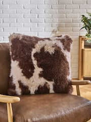 Brown 50 x 50cm Faxu Fur Abstract Cow Print Cushion - Image 1 of 4