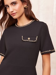 Friends Like These Black Petite Short Sleeve Ponte Shift Mini Dress With Gold Chain Detailing - Image 2 of 4