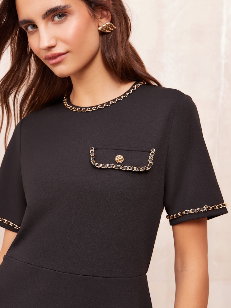 Friends Like These Black Petite Short Sleeve Ponte Shift Mini Dress With Gold Chain Detailing - Image 2 of 4