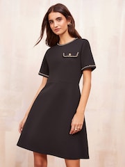 Friends Like These Black Petite Short Sleeve Ponte Shift Mini Dress With Gold Chain Detailing - Image 3 of 4