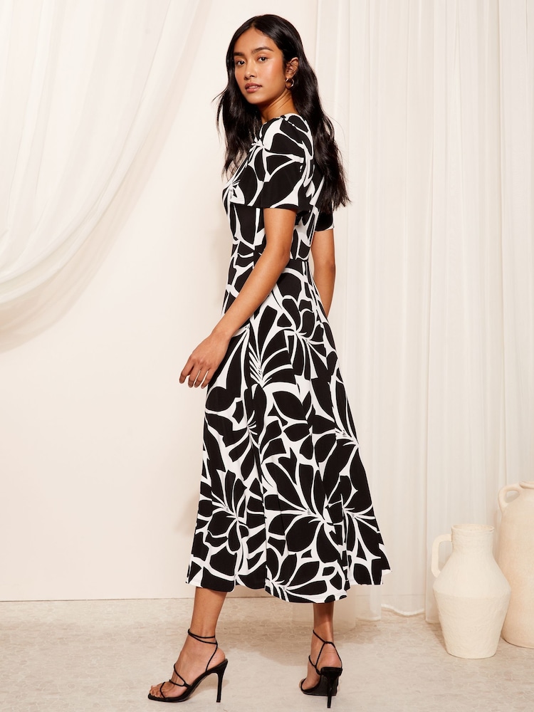 Friends Like These Black/White ITY Flutter Short Sleeve Midi Dress - Image 1 of 4
