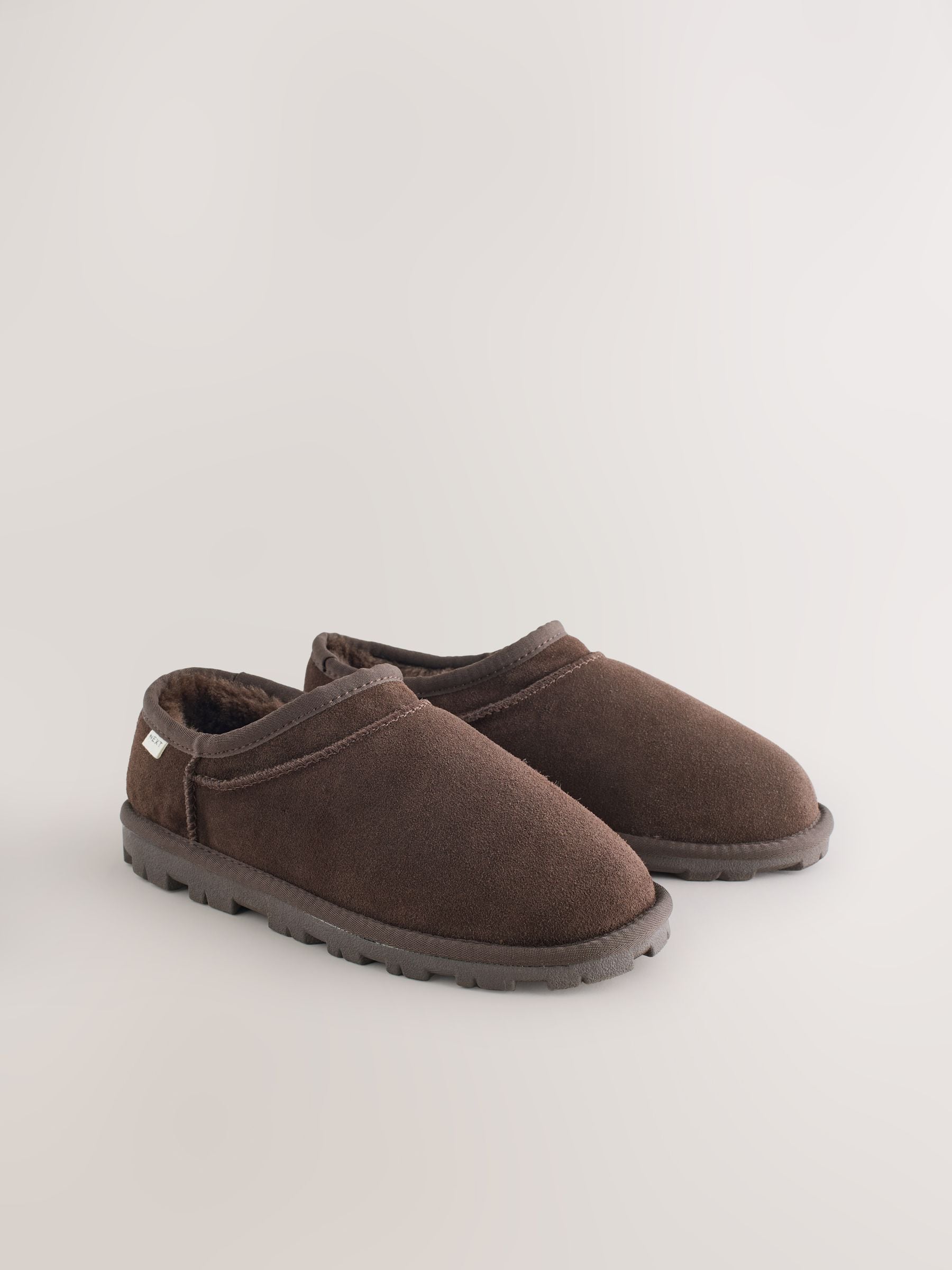 Buy Chocolate Brown Suede Mini Boot Slippers from the Next UK