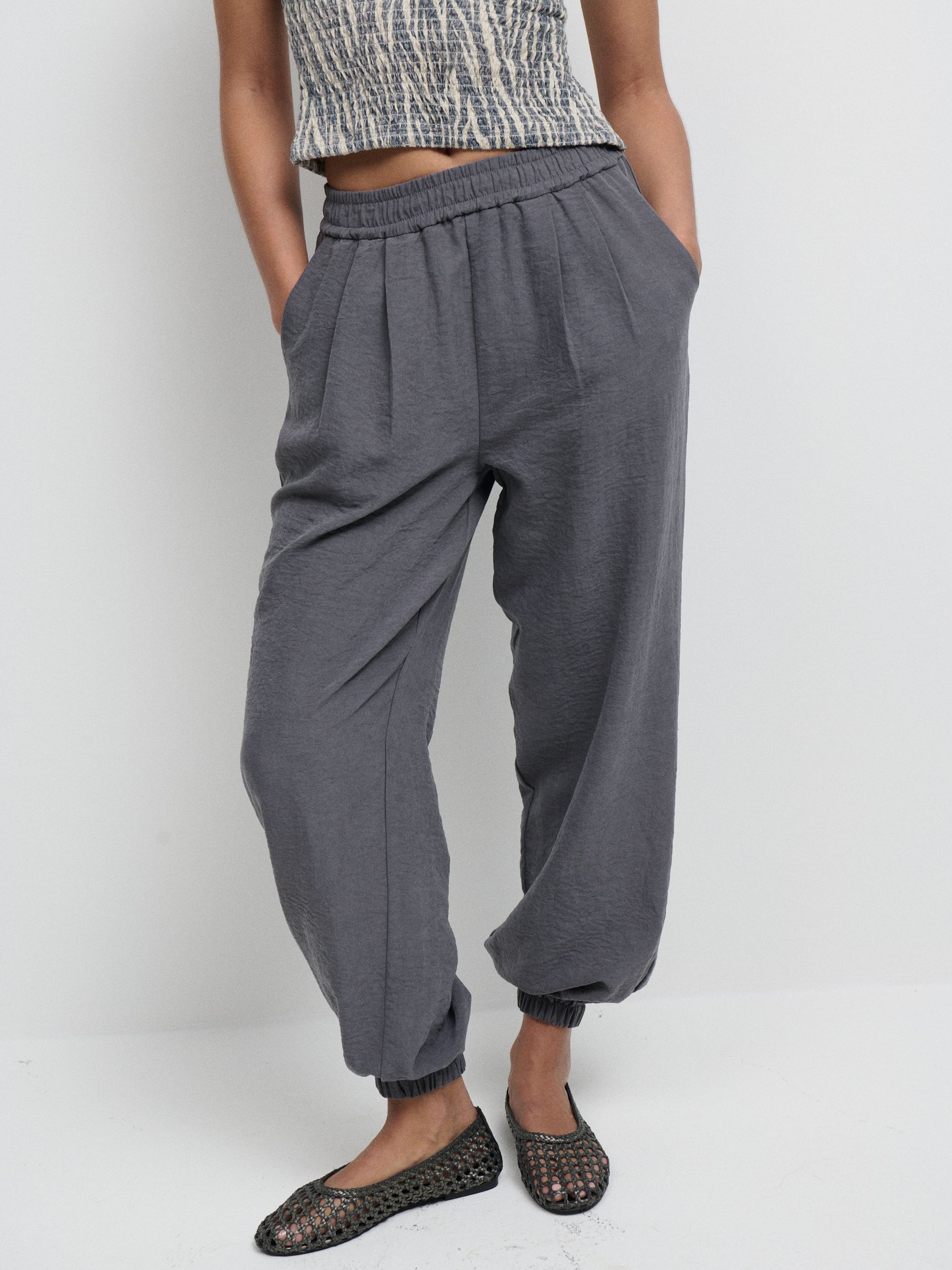 Buy Charcoal Grey Soft Touch Cuffed Balloon Leg Trousers from Next USA