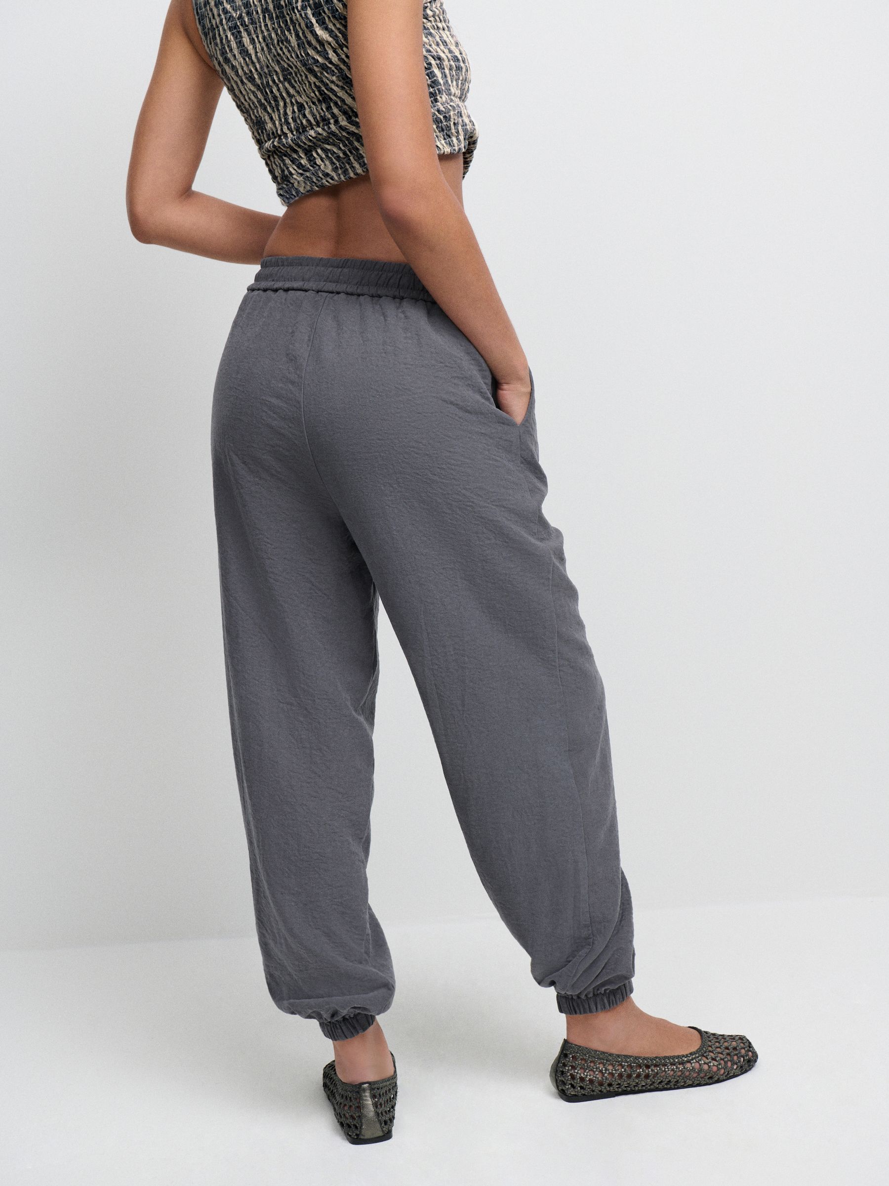 Buy Charcoal Grey Soft Touch Cuffed Balloon Leg Trousers from Next USA