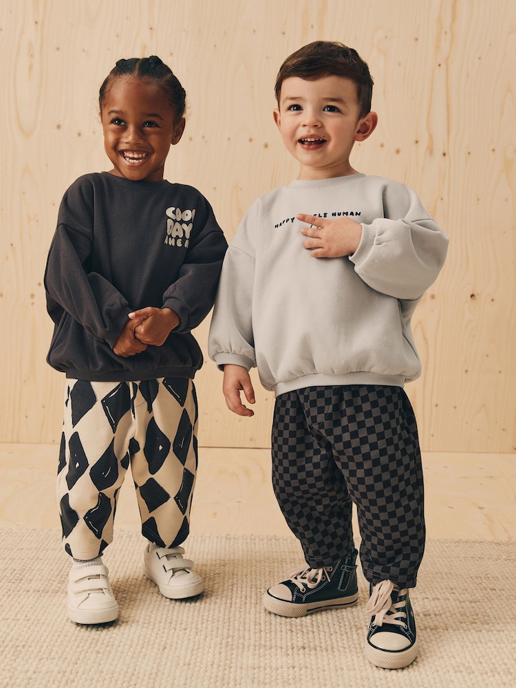 Black/White Printed Sweatshirt And Joggers Set 2 Pack (3mths-7yrs) - Image 2 of 13 Black/White Printed Sweatshirt And Joggers Set 2 Pack (3mths-7yrs) - Image 2 of 13