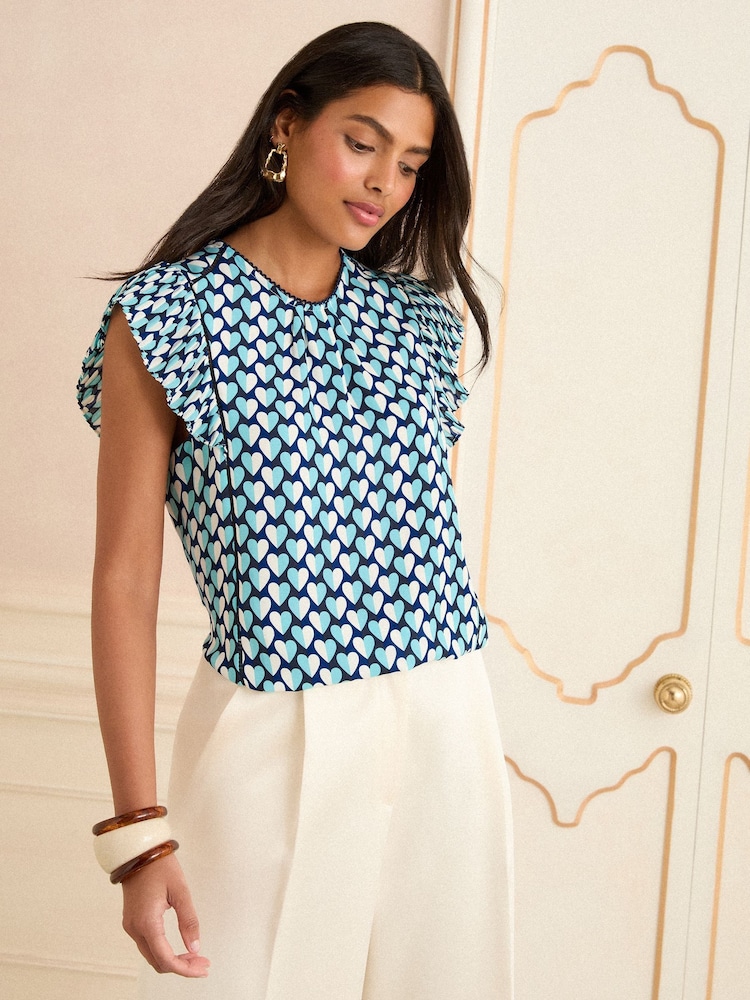 Love & Roses Blue Heart Flutter Sleeve Shell Top - Image 1 of 4 Love & Roses Blue Heart Flutter Sleeve Shell Top - Image 1 of 4