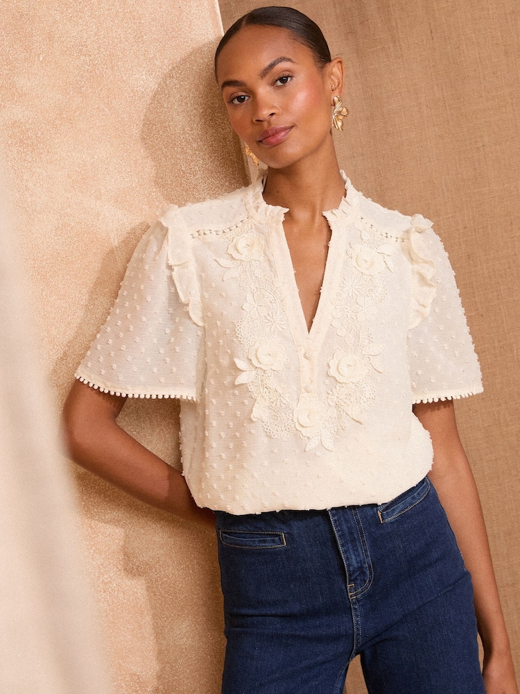 Love & Roses Ivory Short Sleeve V-Neck Dobby Blouse - Image 1 of 4 Love & Roses Ivory Short Sleeve V-Neck Dobby Blouse - Image 1 of 4