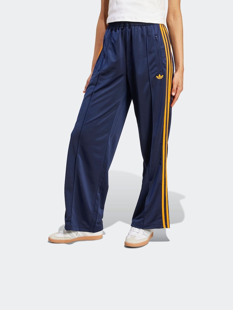 adidas Originals Navy Blue Firebird Loose Joggers - Image 1 of 6 adidas Originals Navy Blue Firebird Loose Joggers - Image 1 of 6