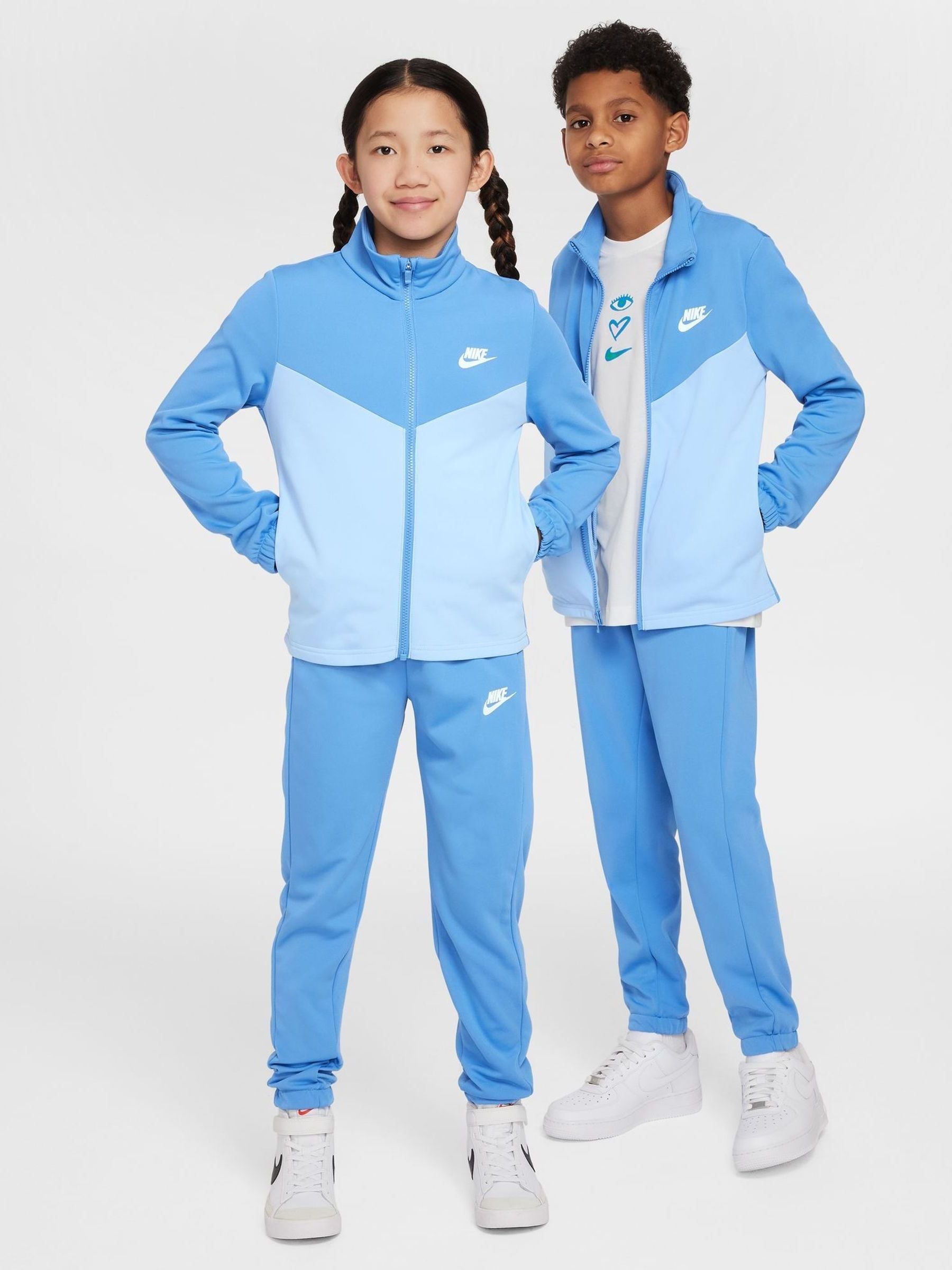 blue and white nike tracksuit