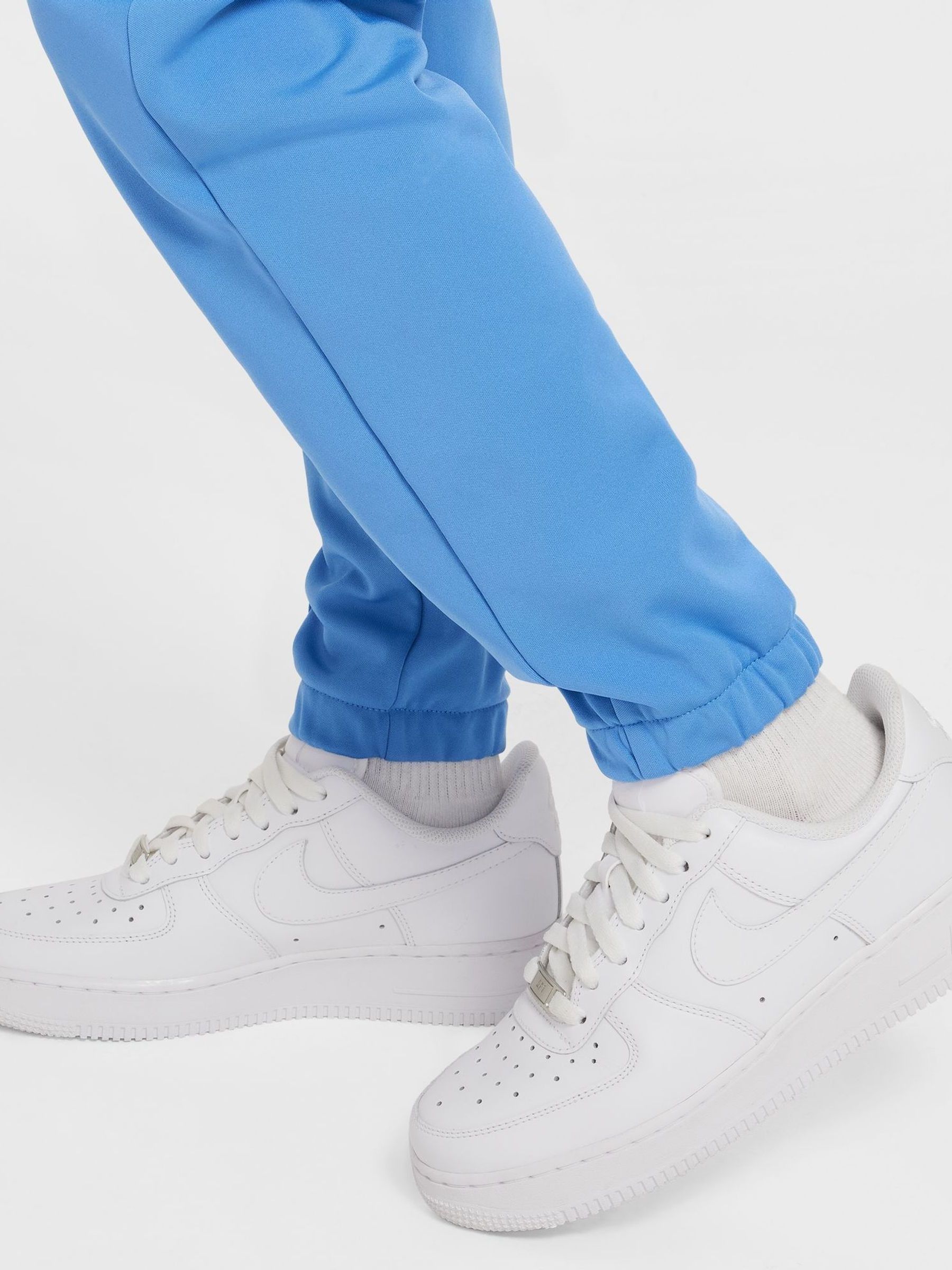 light blue nike tracksuit womens