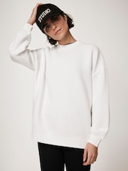 Mint Velvet Gestepptes Sweatshirt mit Druckknöpfen - Bild 3 von 9