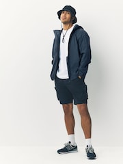 Azul marino - Chaqueta ligera con diseño plegable e impermeable con capucha - Imagen 2 de 11