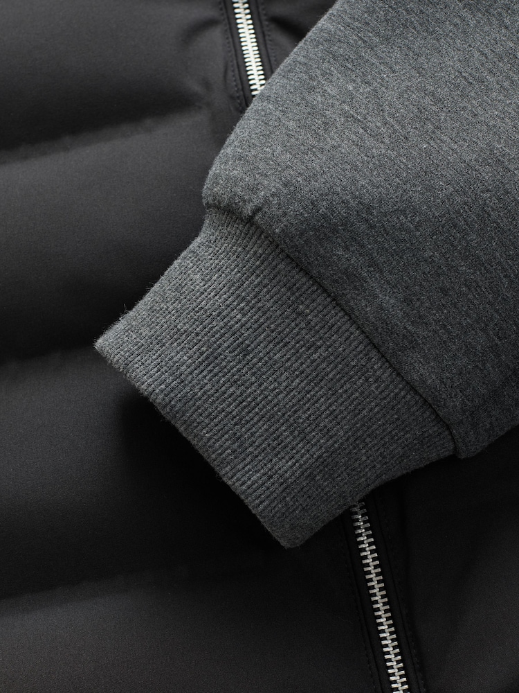 Schwarz - Gesteppte Hybridjacke - Bild 10 von 10 Schwarz - Gesteppte Hybridjacke - Bild 10 von 10