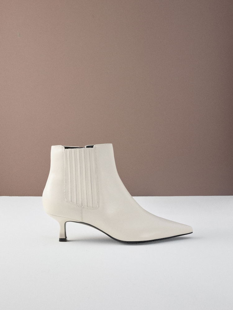Bone White Leather Motion Flex Almond Toe Chelsea Style Ankle Boots - Image 1 of 8