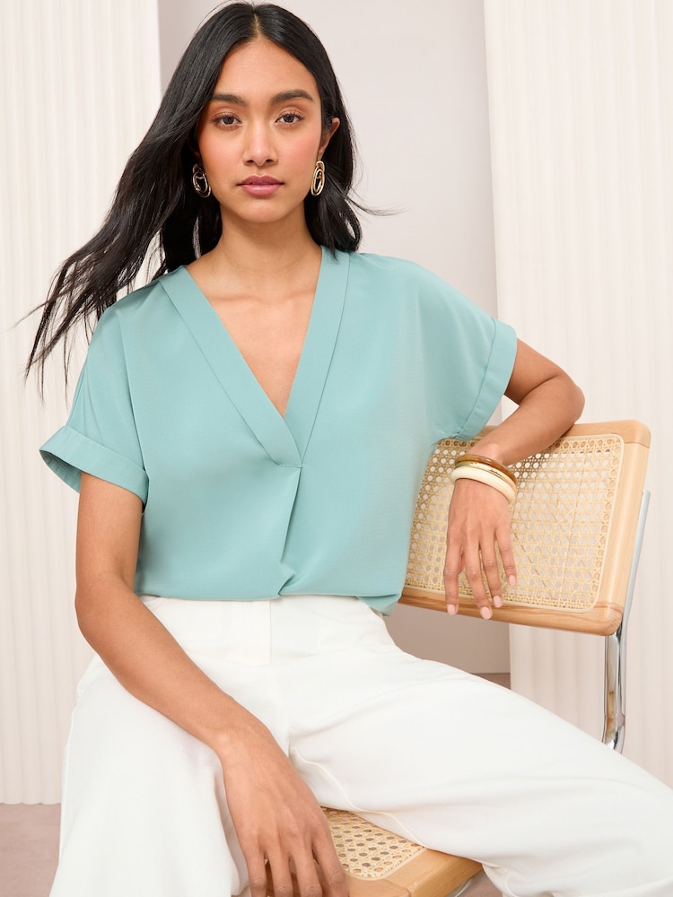 Friends Like These Blue Short Sleeve Notch Neck Blouse - Image 1 of 4