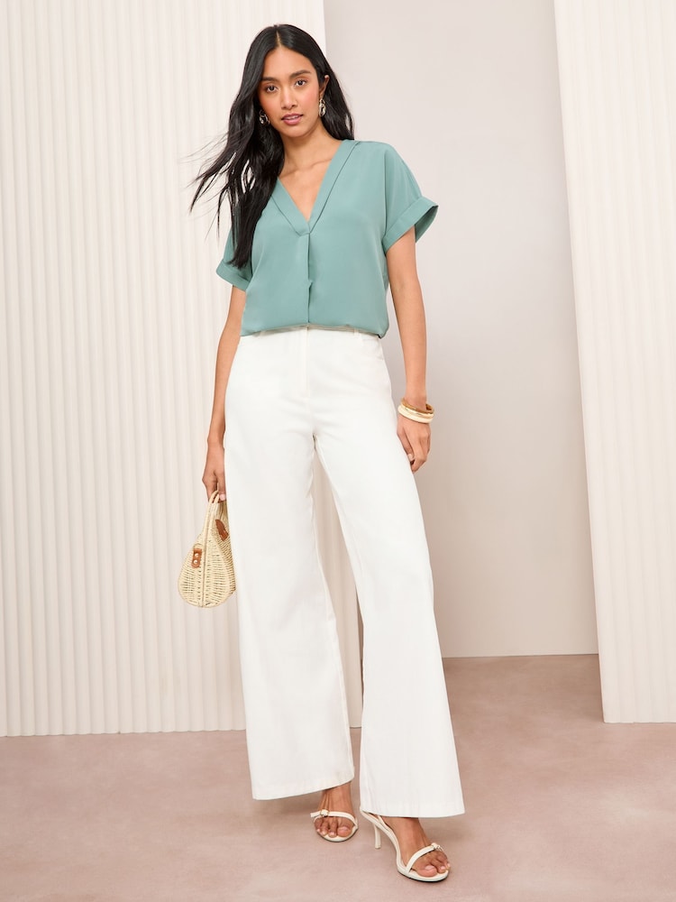 Friends Like These Blue Short Sleeve Notch Neck Blouse - Image 4 of 4