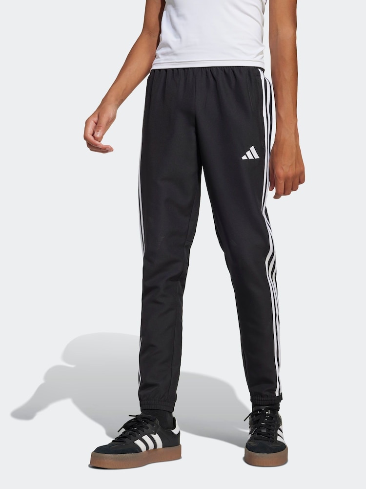 Negro/Blanco - adidas Tiro 25 Essentials Woven Kids Joggers - Imagen 1 de 6