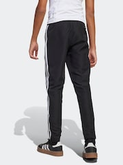 Negro/Blanco - adidas Tiro 25 Essentials Woven Kids Joggers - Imagen 2 de 6