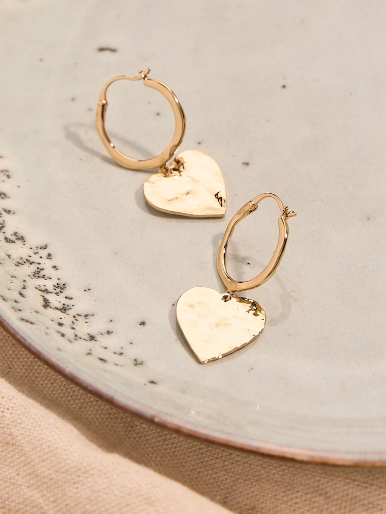 FatFace Gold Tone Large Hammered Heart Earrings - Image 2 of 2 FatFace Gold Tone Large Hammered Heart Earrings - Image 2 of 2