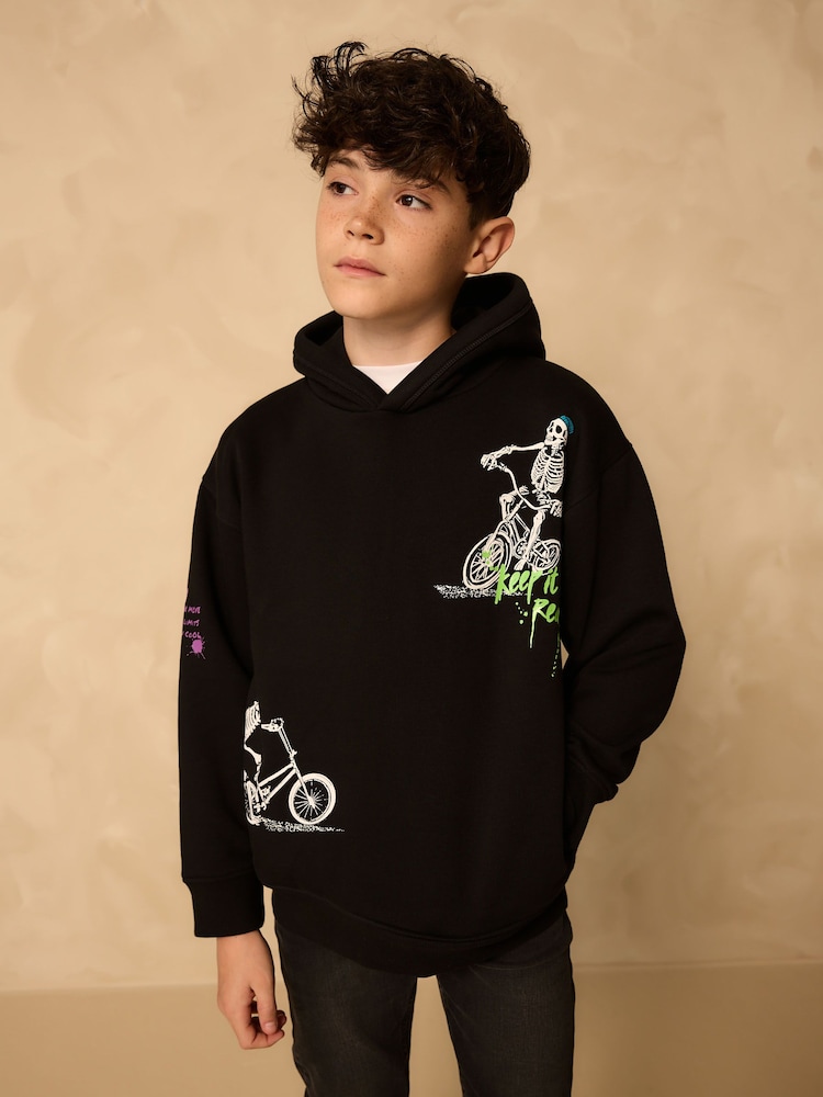Black Skeleton Older Boys Graphic Print Cross-Over Hoodie (3-16yrs) - Image 1 of 8 Black Skeleton Older Boys Graphic Print Cross-Over Hoodie (3-16yrs) - Image 1 of 8
