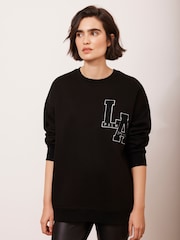 Mint Velvet Black Cotton Blend Relaxed Glamour Logo Sweatshirt - Image 1 of 9