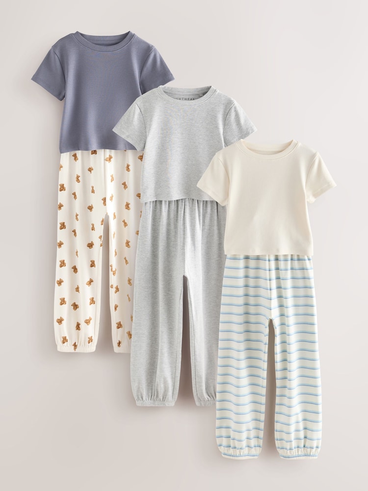 Blue/Neutral Stripe Bear Joggers Pyjamas Set 3 Pack (3-16yrs) - Image 1 of 8 Blue/Neutral Stripe Bear Joggers Pyjamas Set 3 Pack (3-16yrs) - Image 1 of 8