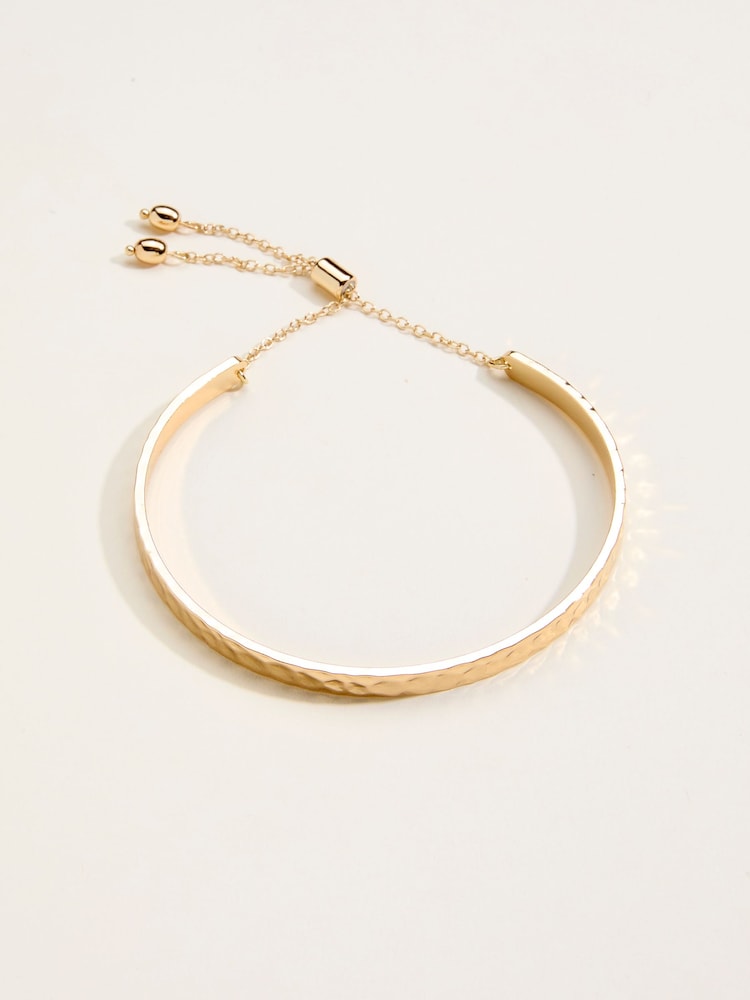 FatFace Gold Tone Hammered Bangle - Image 1 of 2