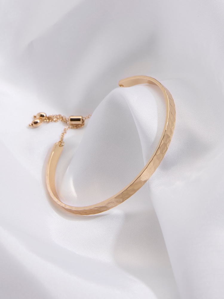 FatFace Gold Tone Hammered Bangle - Image 2 of 2 FatFace Gold Tone Hammered Bangle - Image 2 of 2